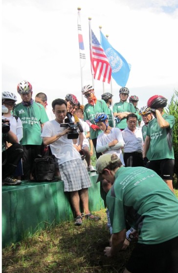 U.S. Ambassador, Honorable Kathleen Stephens collects soil from the Pusan Area of the Republic of Korea
